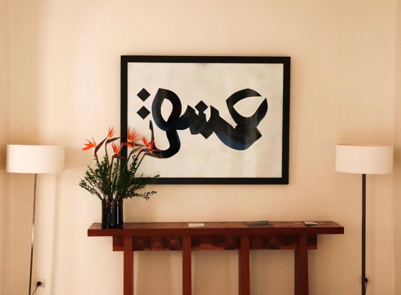 Dar El Jeld Hotel And Spa Tunis Exterior photo A painting of the word "عشق" (ashq) meaning "love" in Arabic.